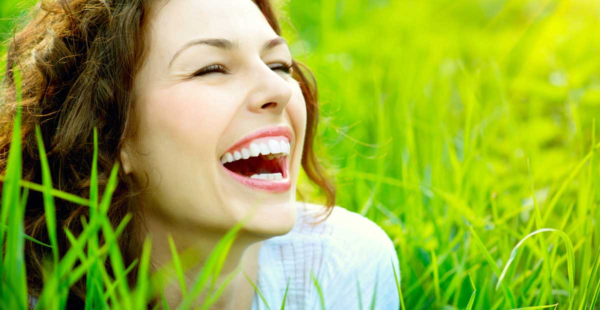 smiling woman in field